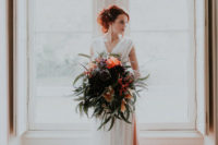 03 The bride was wearing a gorgeous lace wedding dress with a V-neckline, ivory on the front and peachy pink on the back