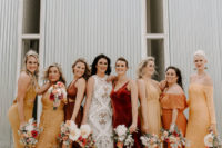 03 The bridesmaids were wearing a selection of mustard, rust, burgundy gowns in boho style and suede booties