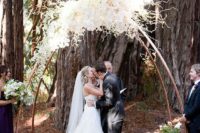 03 this white orchid wedding arch looks utterly magical in this ceremony among the redwoods