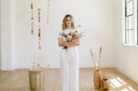 04 The bride was first wearing a handmade white linen suit and flats for a minimalist feel