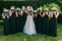 04 The bridesmaids were wearing forest green maxi gowns with a V-neckline