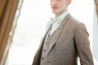 05 The groom was wearing a three-piece linen suit with a colorful printed bow tie