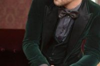 06 an emerald velvet groom’s suit with a striped shirt and a bow tie for a stylish winter groom look and a comfortable feel