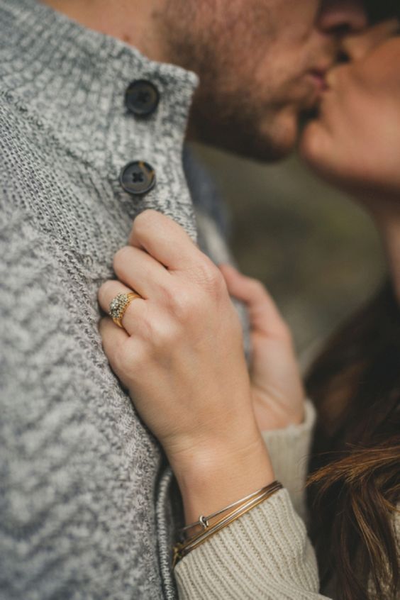 show off your engagement ring while kissing each other and this will be an epic and romantic shot