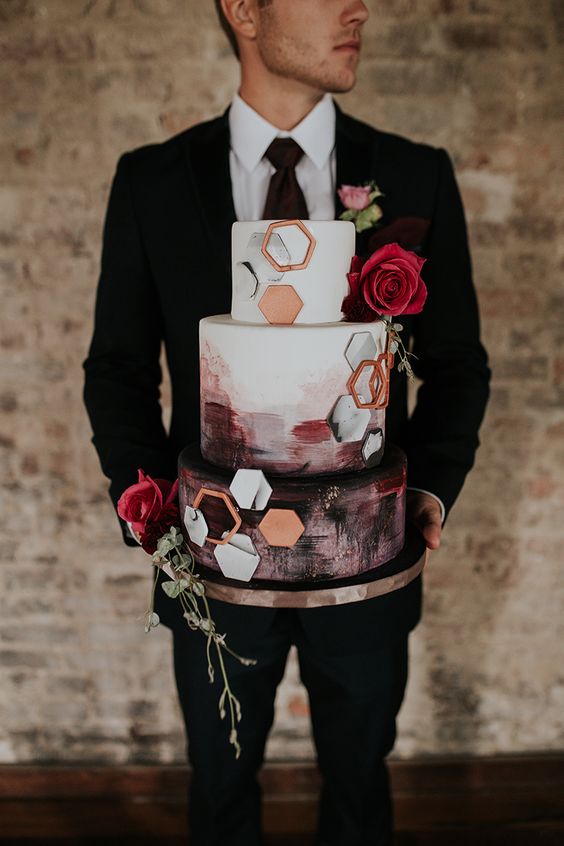 a bright watercolor wedding cake with marble and copper hexagons is a chic and bold idea and a masterpiece