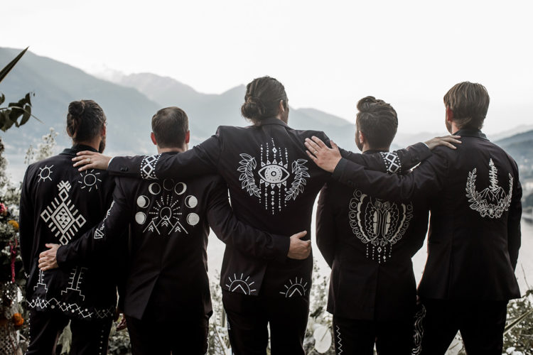 The groomsmen were rocking various tuxedos with different embroidery in boho style