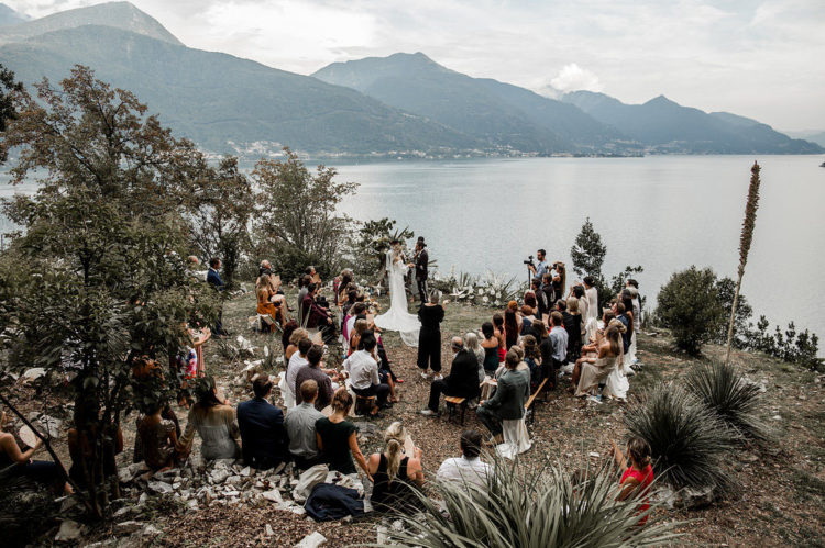 The ceremony took place on the shore of Lake Como, which was decorated with white blooms and greenery