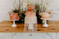 11 The wedding cakes were done in rust, with an ombre effect, blooms and macrame for decor