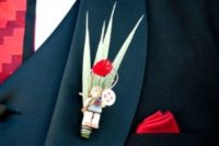 11 a nerdy boutonniere dedicated to Super Mario game, with foliage and a small LEGO piece