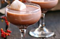 14 winter ho chocolate martinis with marshmallows as a signature drink at the wedding