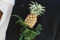 15 a little pineapple plus foliage is an amazing idea for a tropical wedding and a whimsical touch to the outfit