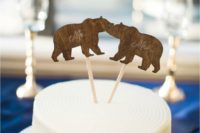 16 plywood or wood bear cake toppers are a simple idea for a woodland or rustic wedding in winter