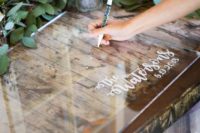 18 a clear guest book sign and some chalk pens are great for a modern and many other weddings and looks original