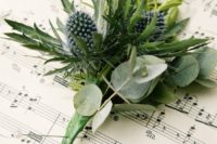 18 a greenery boutonniere spruced up with blue thistles for a textural look and a bold touch