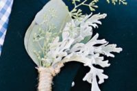 19 a pale greenery boutonniere of foliage, seeded eucalyptus and dusty miller for a frosty feel