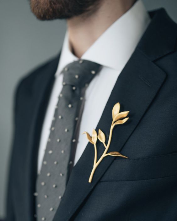 a 3D printed metal boutonniere in gold is a fantastic boutonniere to add a natural yet whimsy touch