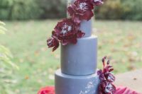 23 a fantastic matte grey wedding cake with burgundy sugar blooms and silver leaf looks wow
