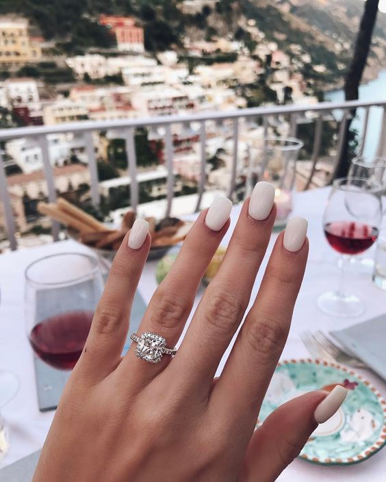 include a beautiful view of the place where you are getting engaged into your engagement ring show off