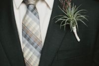 24 a chic boutonniere with an air plant and herbs for a touch of color and texture for a bold look