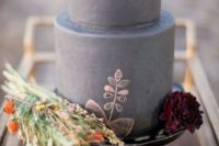 24 a matte grey wedding cake with burgundy blooms and herbs is a gorgeous idea for a fall wedding