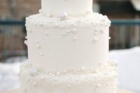 24 a white wedding cake with sugar pearls attached is ideal for a winter wonderland wedding