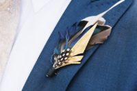 25 a stylish bright feather boutonniere is a creative idea and a nice boho touch to the outfit