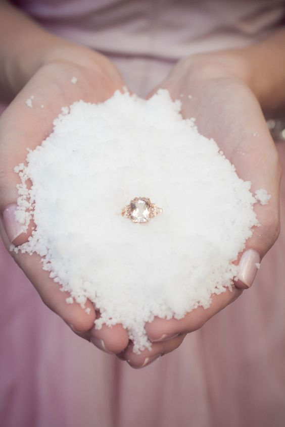 if you are getting engaged in winter, why not take some snow to show off the bling of the ring