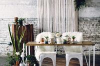 26 white faux fur chair covers will keep you warm and will make your chairs stand out without any usual signs