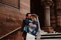 a blue sequin bridal jacket with a pink sequin heart is a fantastic idea for a bold and glam bridal look