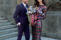 a colorful sequin wedding dress with long sleeves and a high neckline for  amodern and bold city hall elopement