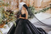 a dramatic black wedding dress