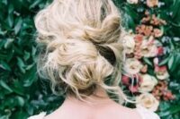 a messy and textured twisted updo is always a win-win idea and you can make it yourself