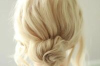 a messy twised low bun with a messy bump on top and some locks down is a chic and cool idea if your style isn’t too formal