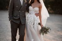 a romantic lace applique sweetheart strapless wedding dress in blush and white is a very chic and lovely idea