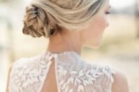 a simple boho wedding hairstyle with a braided low bun and twists is a timeless solution for a Scandinavian bride