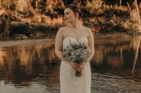 a strapless boho lace fitting wedding dress with a train is ideal for a rustic boho bride