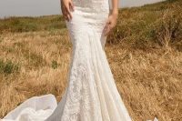 a strapless boho lace mermaid wedding dress with a train looks very chic and sexy