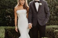 a strapless plain mermaid wedding dress with a train is a cool modern version of a classic mermaid wedding gown