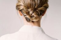 a twisted low bun with a textural top is long-lasting lob styling for a bride or bridesmaid