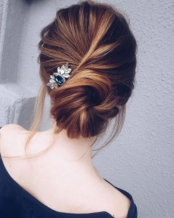 a twisted low bun with some locks down and a pretty small hairpiece will be an elegant solution for a more formal look