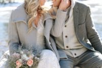 02 a dove grey coat for the bride, a grey jacket and pants for the groom and touches of cream