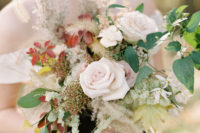 03 Her bouquet included both creamy hues and burgundy ones plus greenery and dried herbs