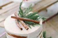 03 a naked wedding cake topped with evergreens and cinnamon sticks – you won’t need more than that for a naturally beautiful look