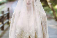 04 There was a matching gold lace veil to make the bridal look complete