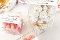 04 various candies packed into acrylic boxes with tags are a timeless favor for any wedding