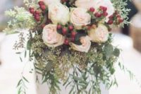 05 a holiday wedding bouquet with cascading greenery, blush roses, eucalyptus and holly berries