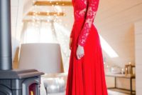 06 a hot red wedding gown with a lace bodice and long sleeves and a plain skirt is a truly Christmassy idea
