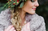 06 rock a beautiful evergreen and berry wedding crown to give your outfit a traditional Nordic look