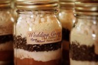 07 a hot cocoa jar with marshmallows is a great idea for a Christmas wedding, keep your guests warm and cozy