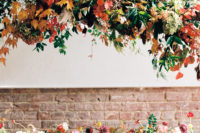 large overhanging flower installation is perfect for a wedding shoot